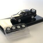 Mercedes Benz Evo 2 Inno64 diecast model showcasing original wheels before modification.