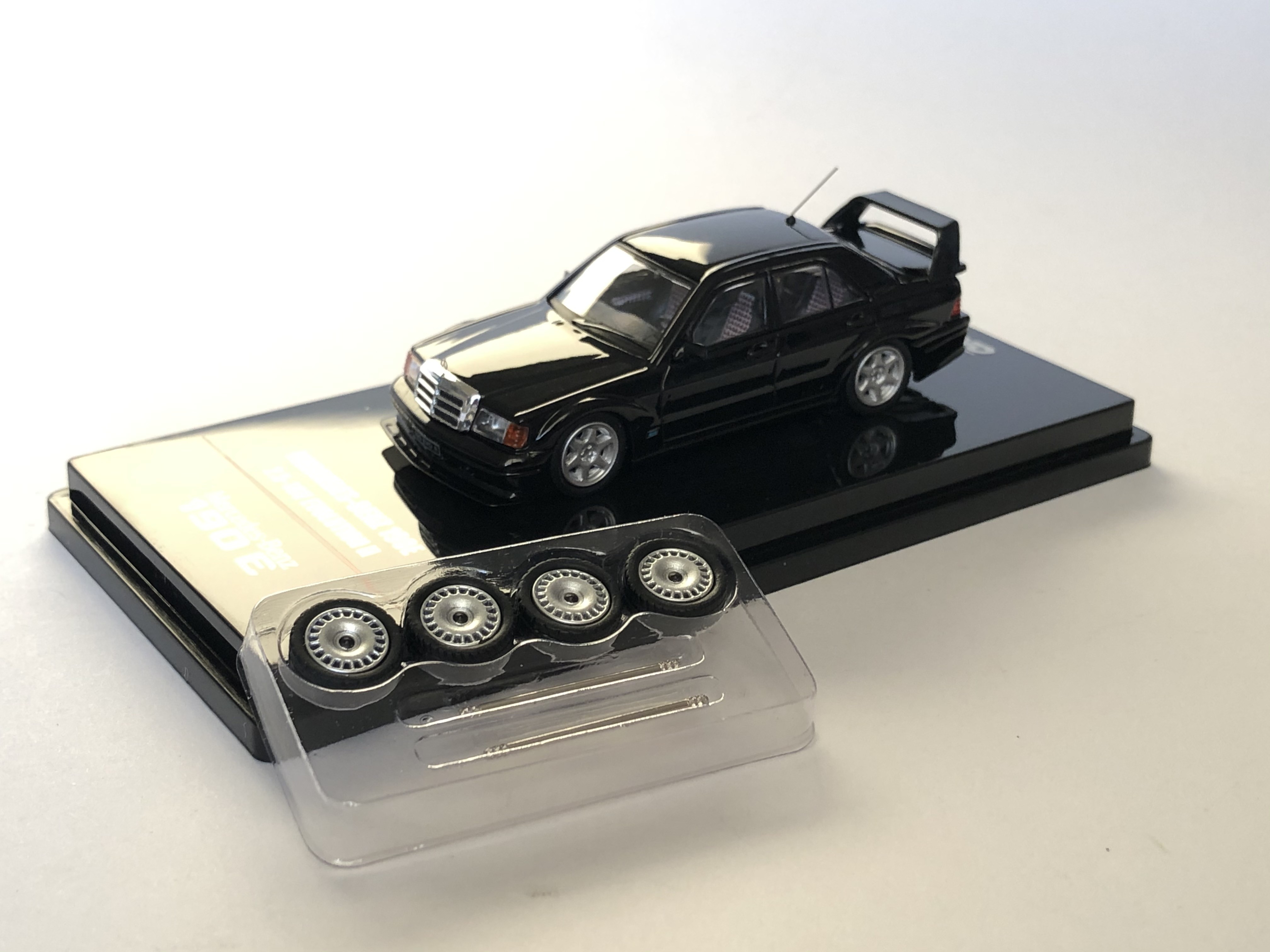 Mercedes Benz Evo 2 Inno64 diecast model showcasing original wheels before modification.