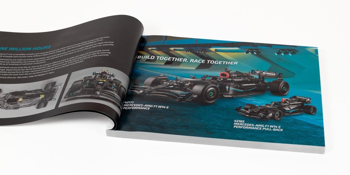 Instruction booklet showcasing both the large and small Mercedes W14 LEGO models.