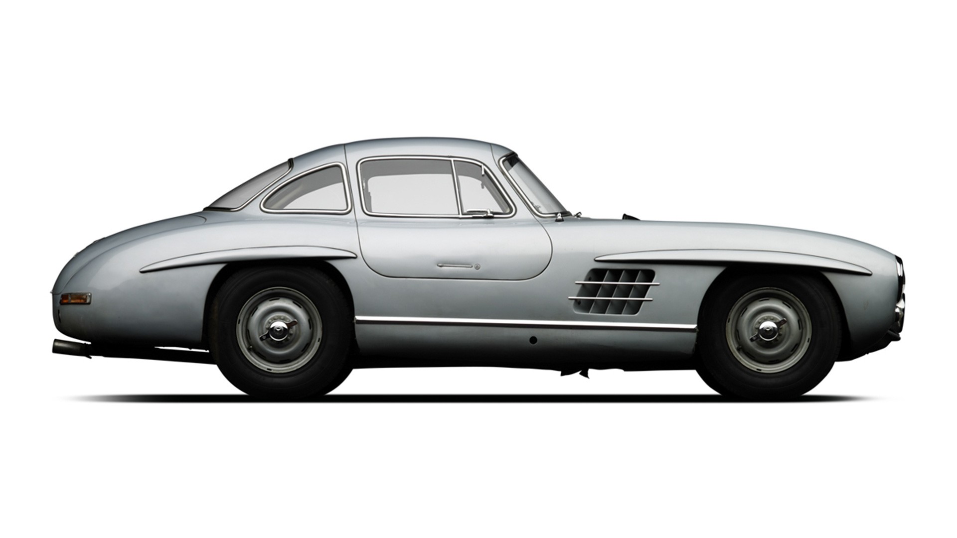 1955 Mercedes 300 SL Gullwing advertised in 1970, highlighting its low mileage and Rudge wheels.