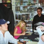 Mercedes McNab at an autograph session, smiling and engaging with fans