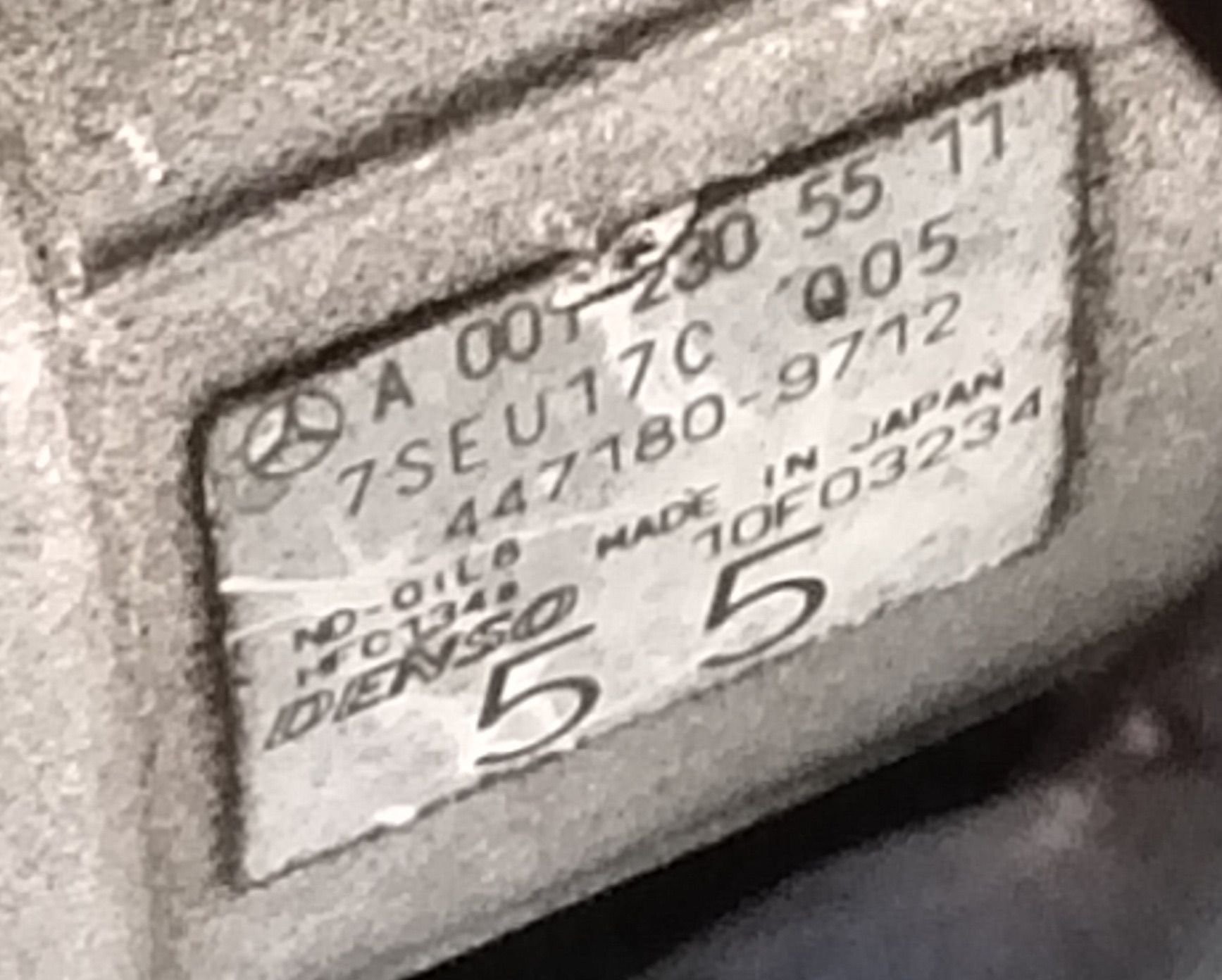 Denso 7SEU10c AC Compressor Label from a 2003 Mercedes Benz C230 Kompressor, showing part number 447180-9712