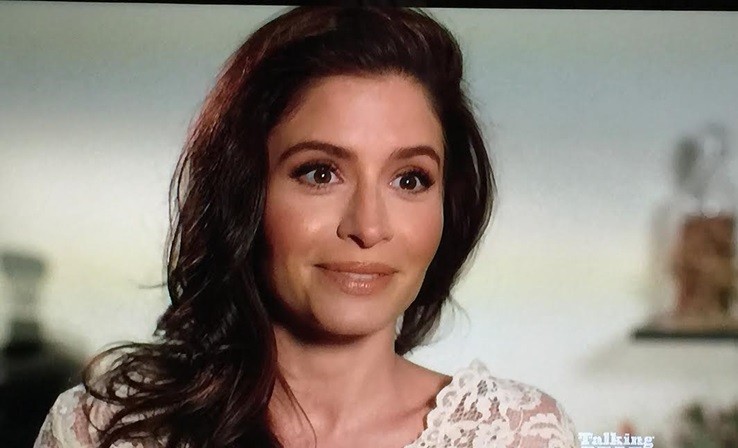 Mercedes Mason nude makeup look on Talking Dead, featuring peach nude lipstick and flattering brown eyeliner for brunettes