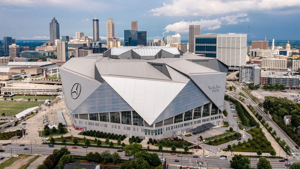 Mercedes-Benz Stadium interior showcasing seating and halo board