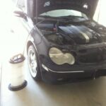 Front view of a 2004 Mercedes C240 W203, highlighting the model for DIY oil change guide.