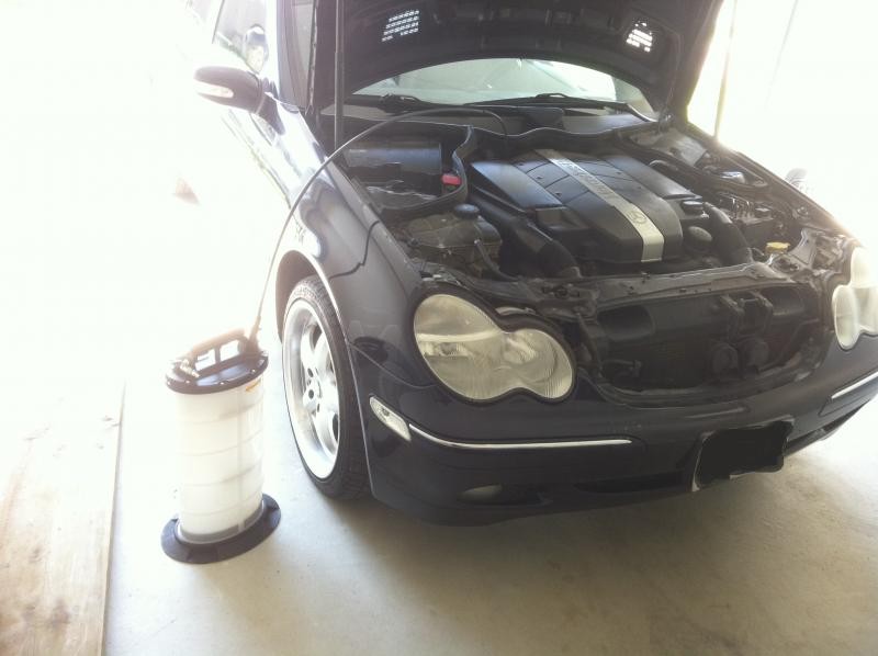 Front view of a 2004 Mercedes C240 W203, highlighting the model for DIY oil change guide.